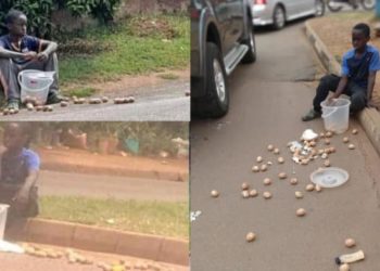 Scam: How popular street kid is using broken eggshells to take advantage of the goodness of people in Accra