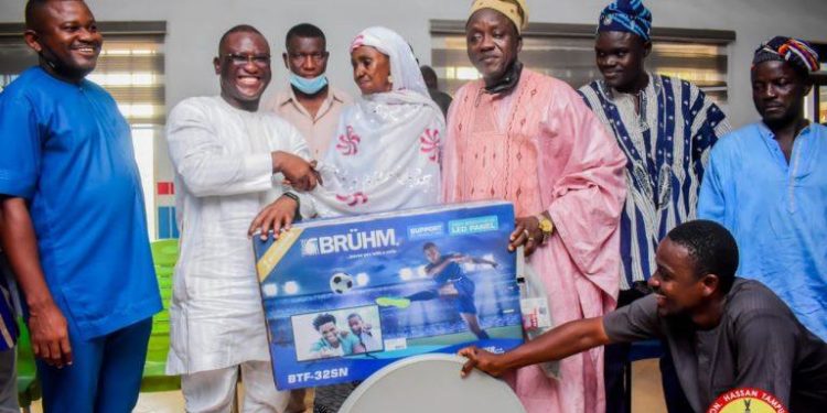 Gushegu MP, Tampuli donates 125 plasma TVs to elderly on 6th March day